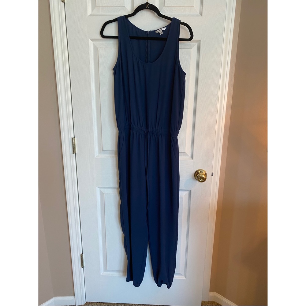 Navy jogger jumpsuit with cinched waist